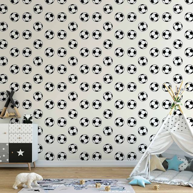 Tapetti - Soccer - Symmetrical black-and-white soccer balls on a beige background.