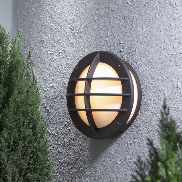 Seinävalaisin 516-752 Oden pyöreä Ø 310 mm musta pistorasialla